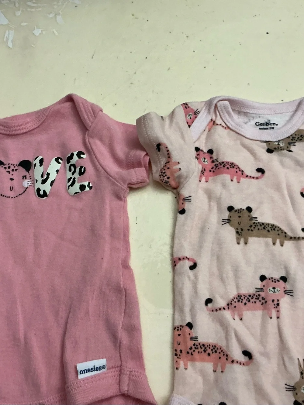 Gerber  Pink Baby One-Piece Bodysuit - Pack of 5 . Size NB fits 5 to 8 pounds